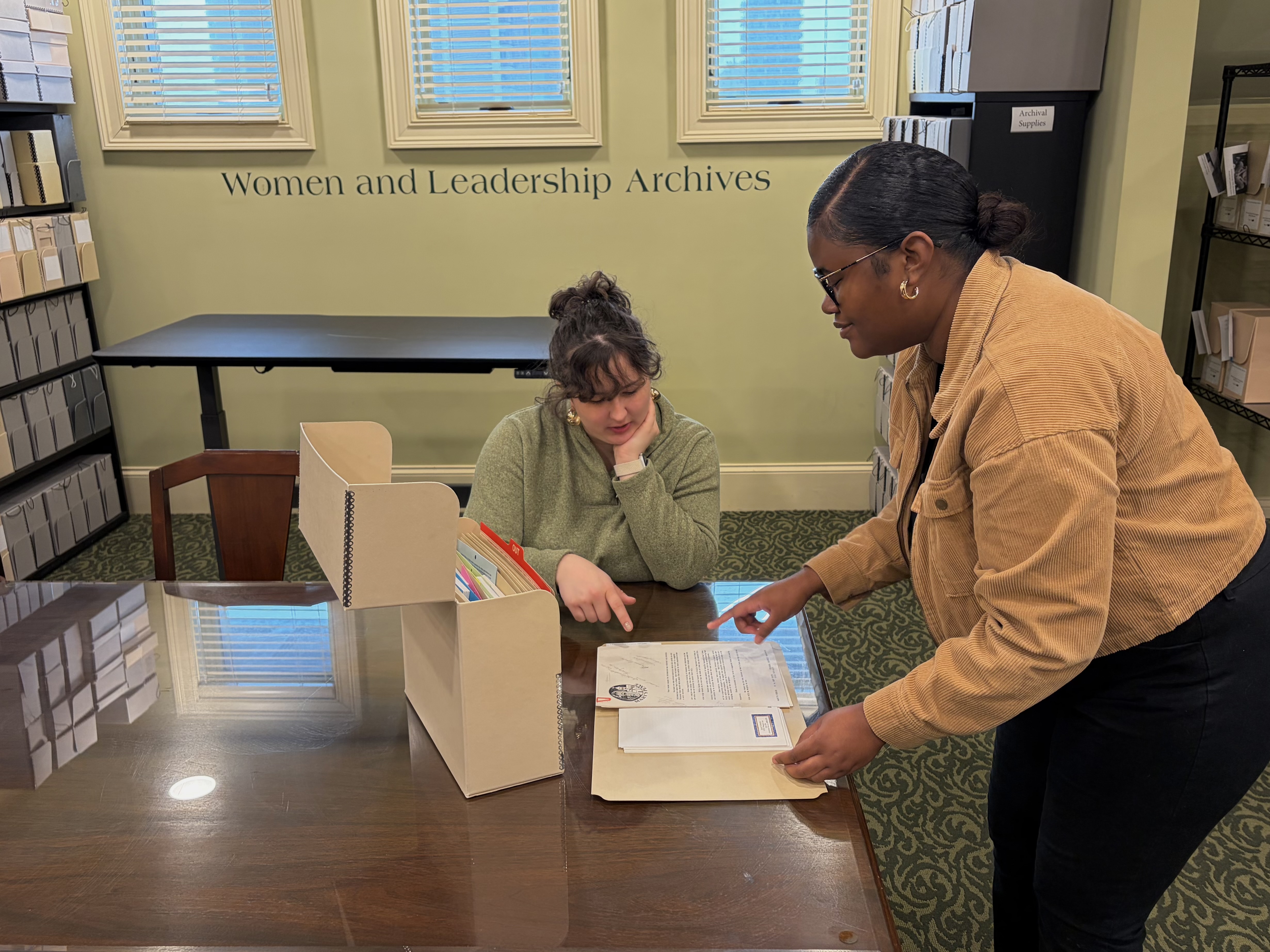 WLA staff assisting a researcher during a research appointment